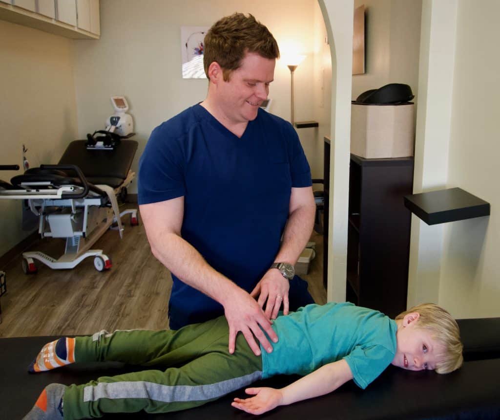 Doctor Dickson entraining a four year old child